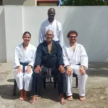 3 international students with Sensei Chris in Suurbraak, South Africa